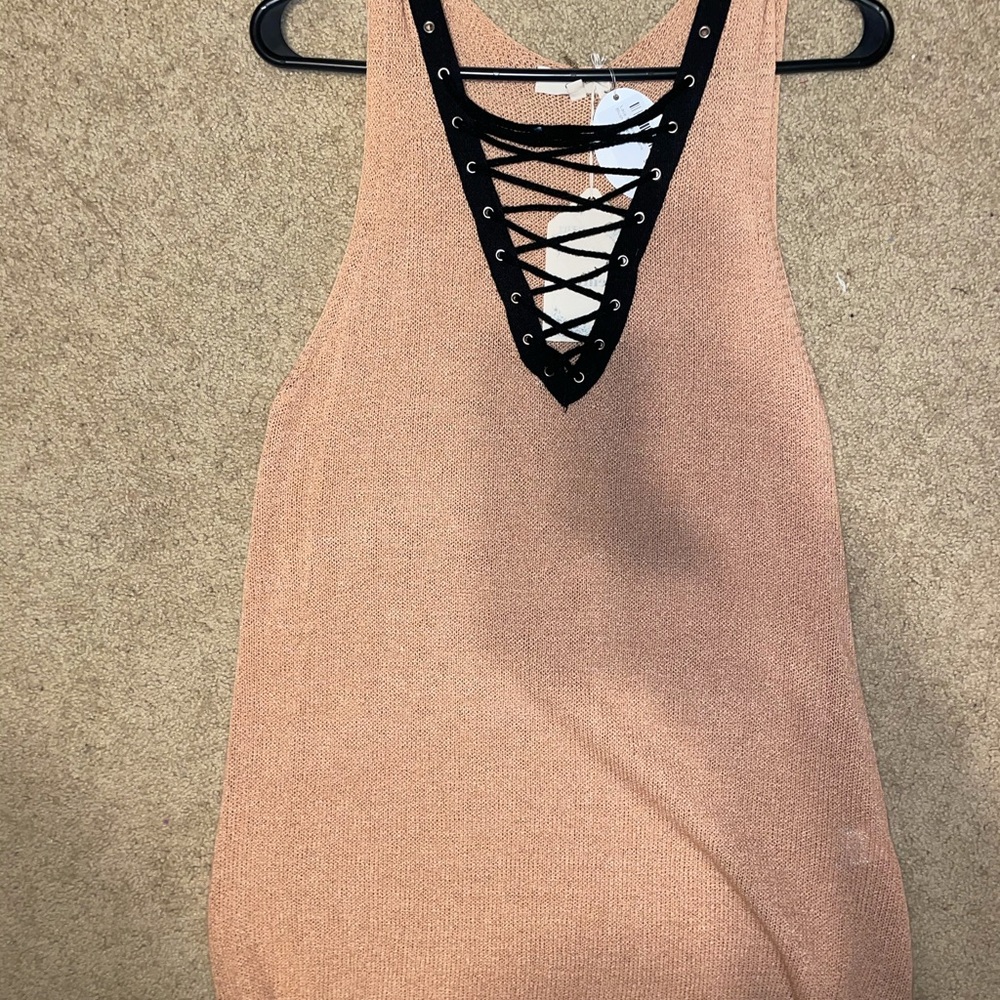 Pinkish tank top with black cut out